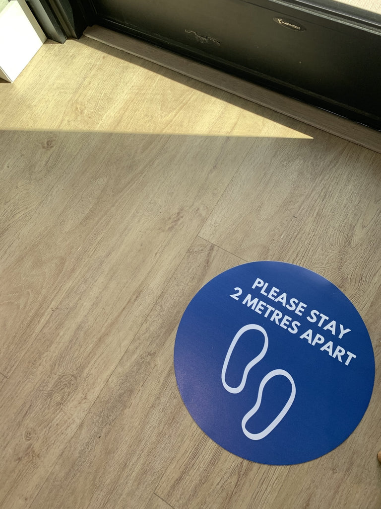 Physical Distancing Floor Sticker - PLEASE STAY 2 METRES APART 12" Round - Surrey Sign Shop
