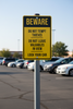 beware of theft sign aluminum composite sign used at a commercial parking lot