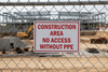 Construction Area sign on construction fence