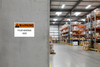 Warning sign in warehouse