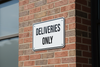 deliveries only sign at a retail business