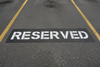 Reserved Parking Stenciled on Parking lot