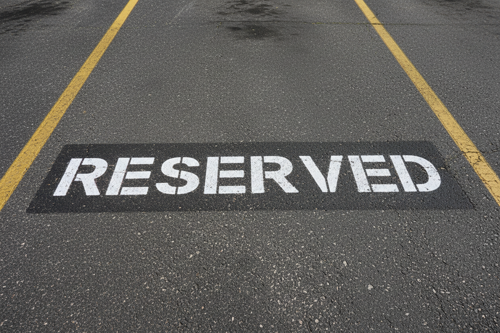 Reserved Parking Stenciled on Parking lot