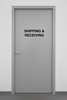 shipping and receiving decal installed onto a door