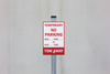 temporary-no-parking-sign_on_a_sign_post